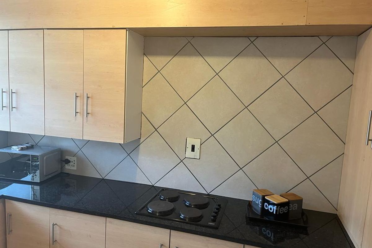 Spacious two bedroom unit in a tranquil complex - Photo 3