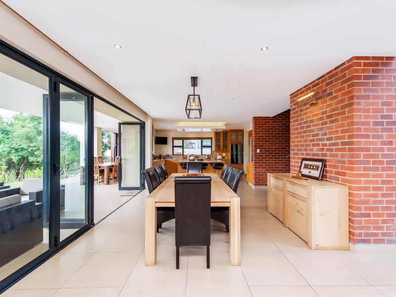 Welcome to this stunning and expansive residence, where luxury meets comfort in every corner. - Photo 9