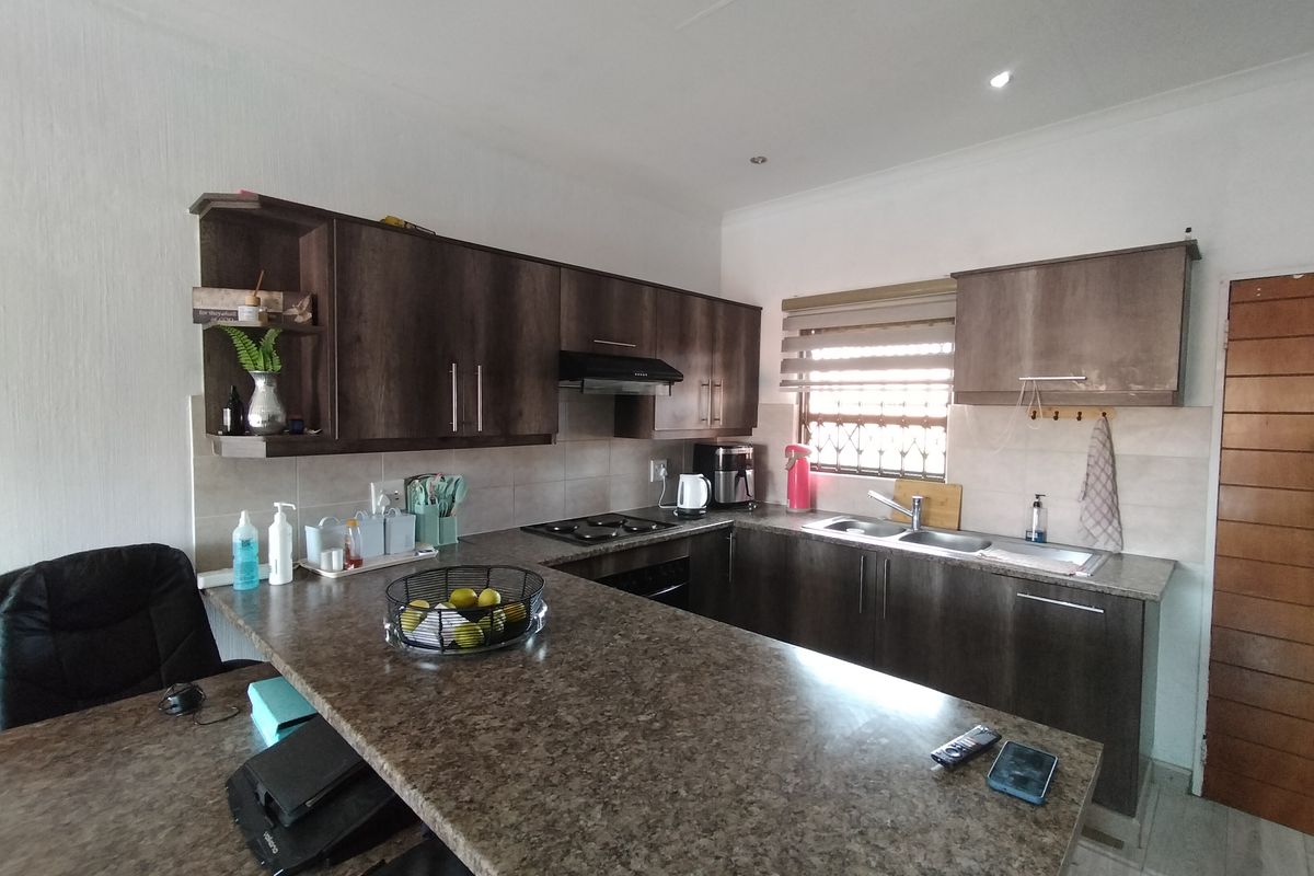 This first-floor apartment boasts a 2- bedroom layout. - Photo 4