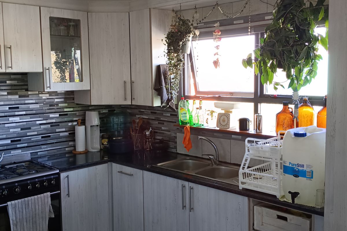 Walking Distance to the Beach with Two Rental Income Generating Flats! in Paradise Beach - Photo 4