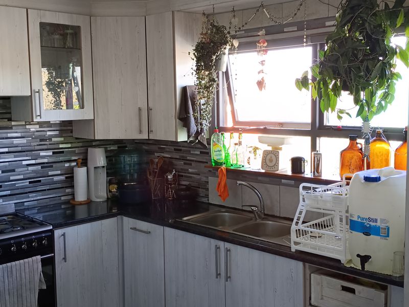 Walking Distance to the Beach with Two Rental Income Generating Flats! in Paradise Beach - Photo 4