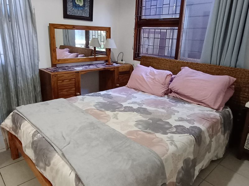 Walking Distance to the Beach with Two Rental Income Generating Flats! in Paradise Beach - Photo 7