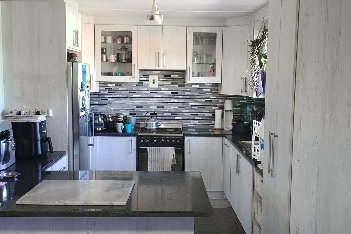 Walking Distance to the Beach with Two Rental Income Generating Flats! in Paradise Beach - Photo 5