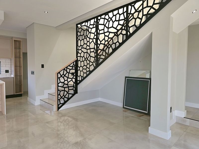 Modern 4-Bedroom, 3 Garage Home with Staff Room and Pool - Photo 8