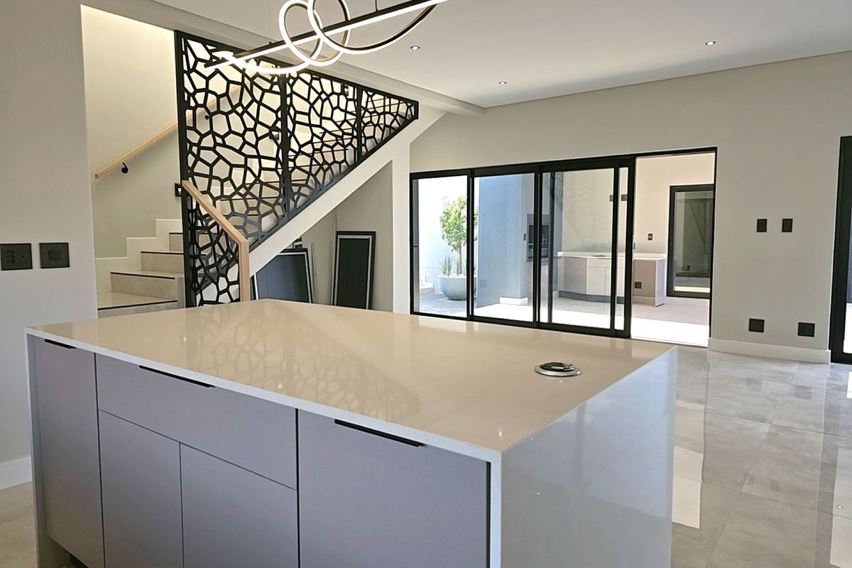 Modern 4-Bedroom, 3 Garage Home with Staff Room and Pool - Photo 3
