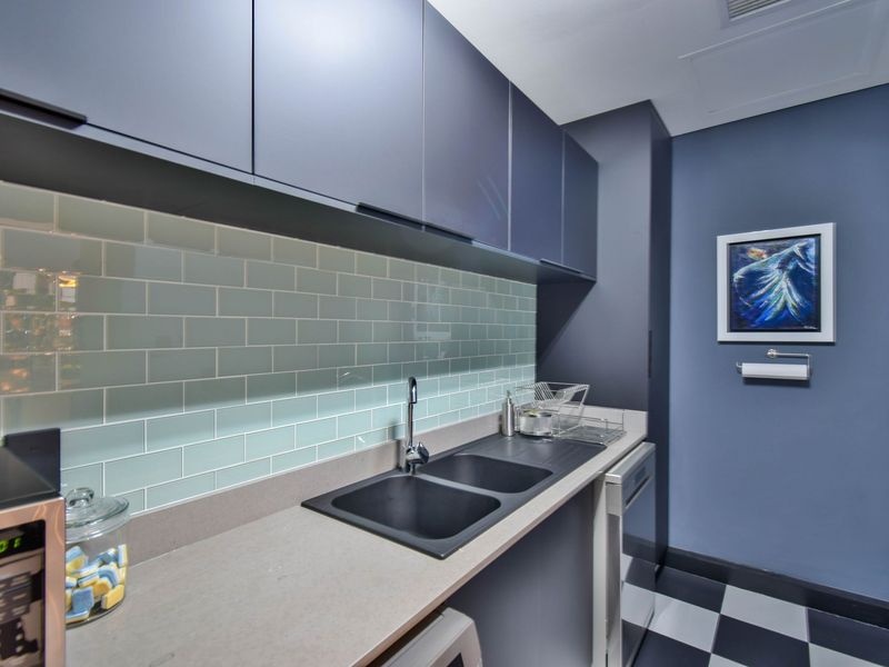 Luxurious Penthouse Living | Lock-Up-and-Go Convenience - Photo 9