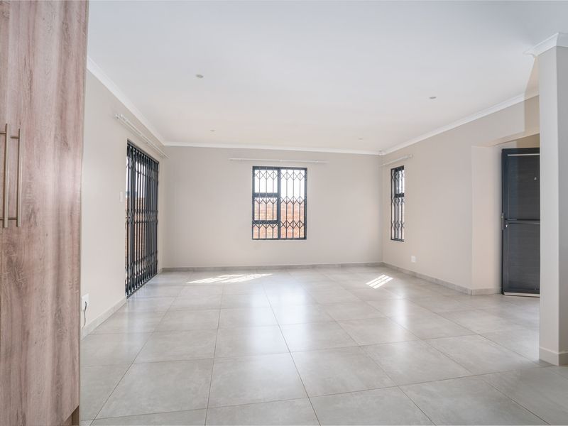 Spacious and Secure Home Designed for Comfort - Photo 6