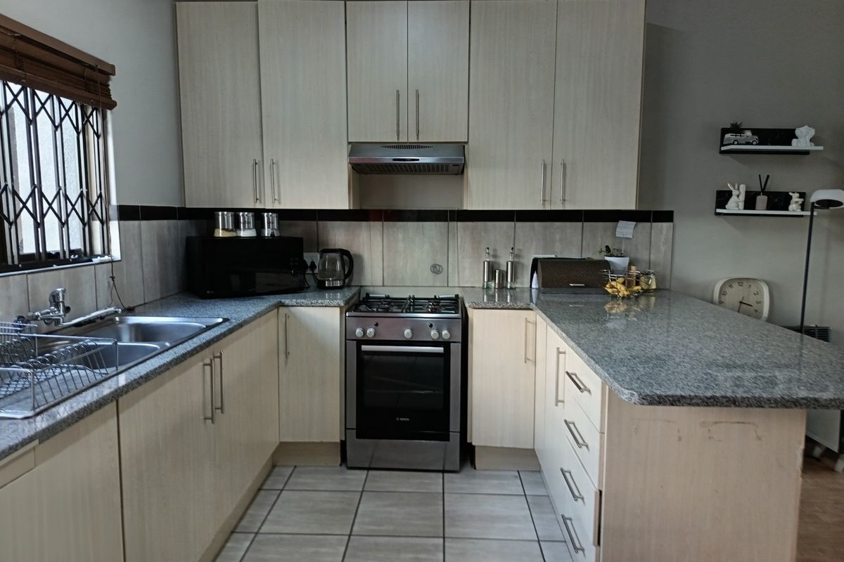 Immaculate Three Bedroom Family Home in Secure Lifestyle Complex - Photo 2