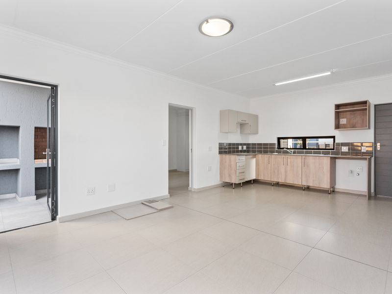 Embrace modern living in this lock up and go apartment... - Photo 6