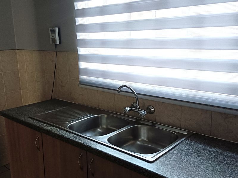 Stylish & Secure 2-Bedroom Duet in a Prime, High-Demand Estate - Photo 9