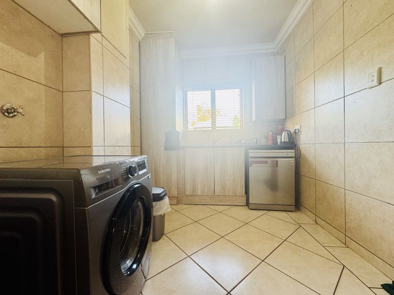 Modern Double-Story 3-Bedroom Home in Green Acres Estate - Photo 9