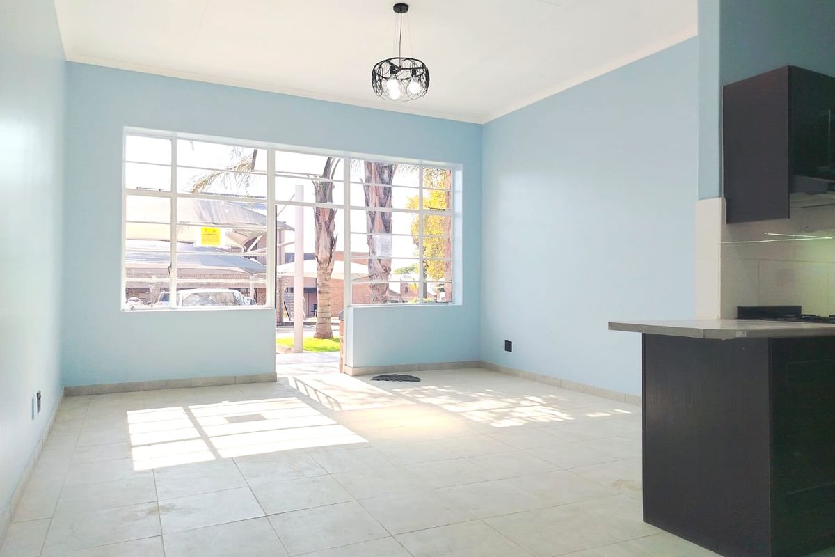 Modern Two-Bedroom Gem with Spacious Living & Inviting Patio - Photo 3