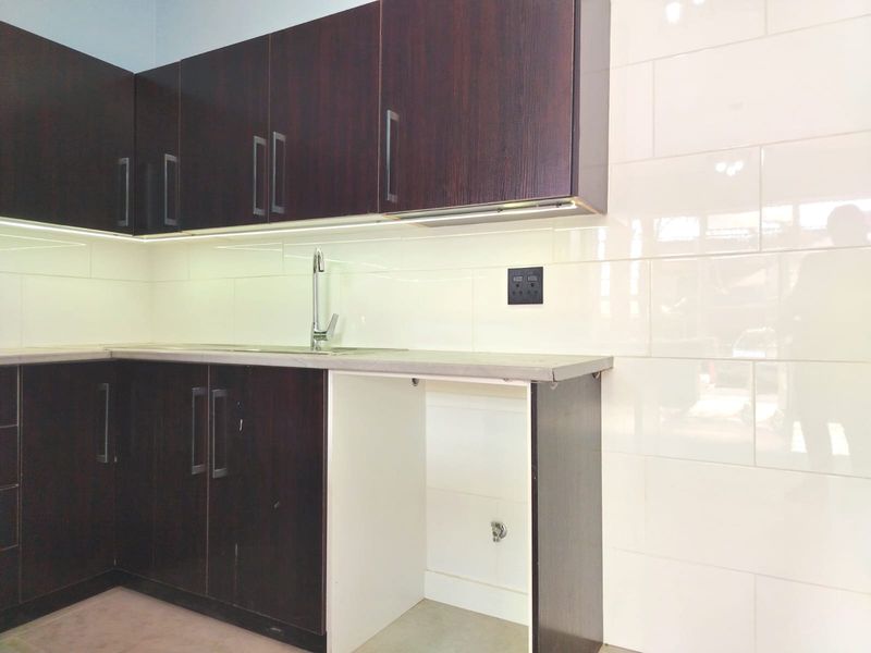 Modern Two-Bedroom Gem with Spacious Living & Inviting Patio - Photo 9