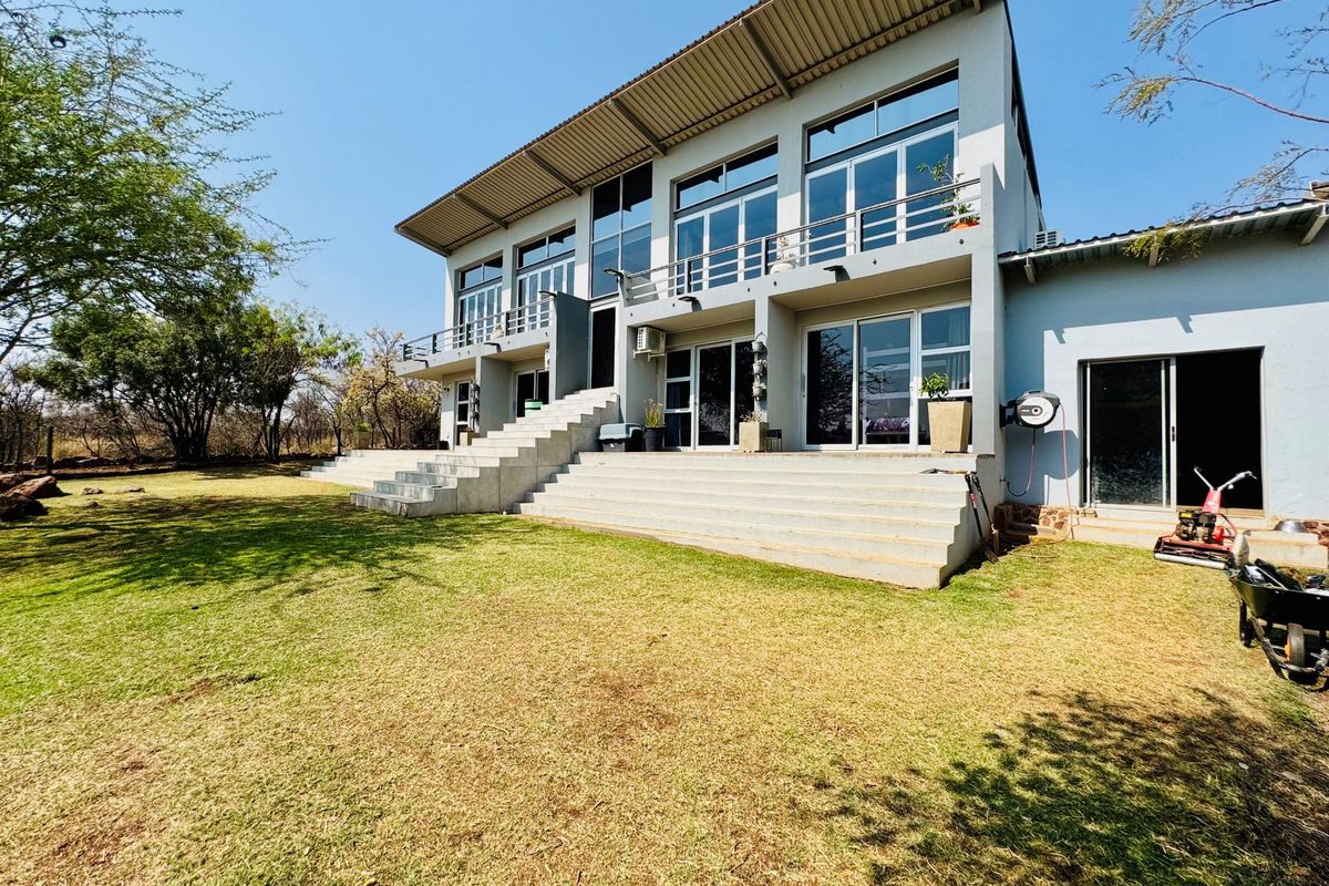 Elegant Double-Story Home with Pool & Scenic Views – Sable Hills Waterfront Estate - Photo 2