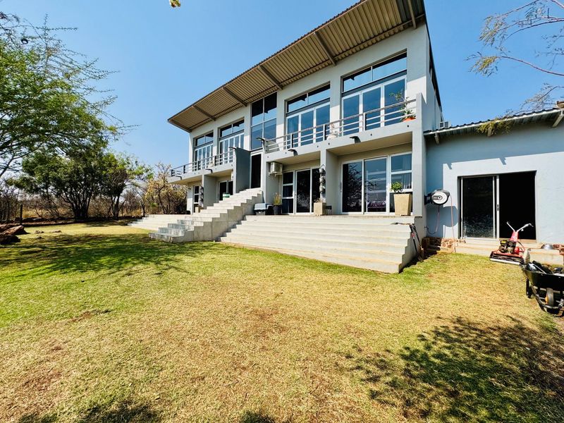 Elegant Double-Story Home with Pool & Scenic Views – Sable Hills Waterfront Estate - Photo 2