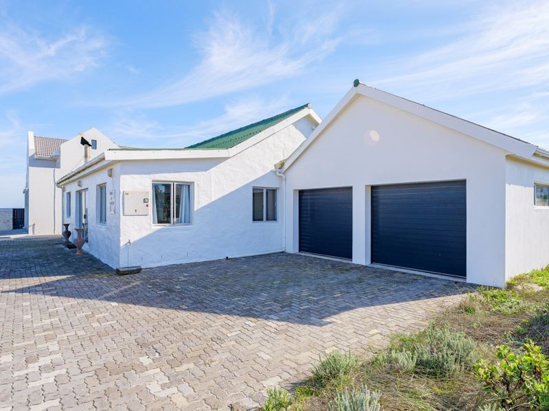 Coastal 2-Bedroom Home with Ensuite, Flatlet, and Modern Amenities - Photo 9