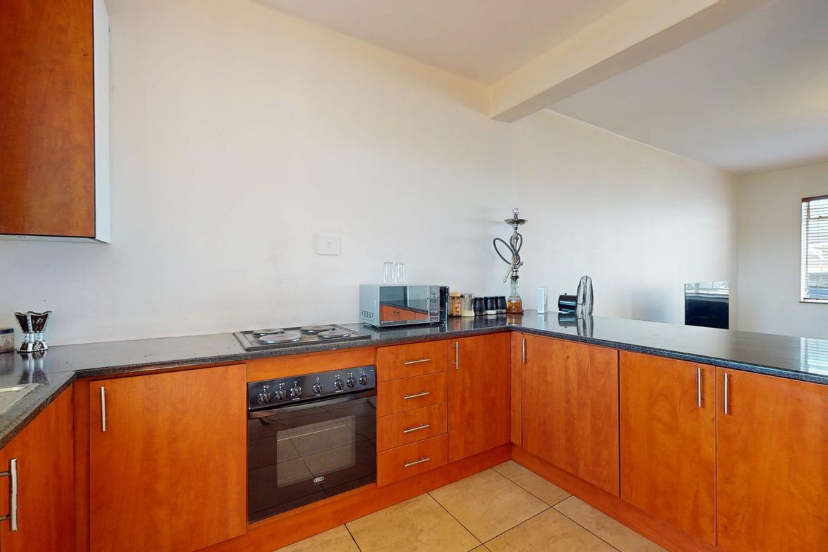 Stylish 1-Bedroom Flat with Modern Finishes - Photo 4