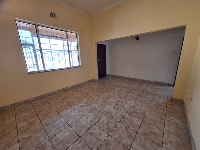 FIXER UPPER WITH EXCELLENT POTENTIAL! - Photo 6