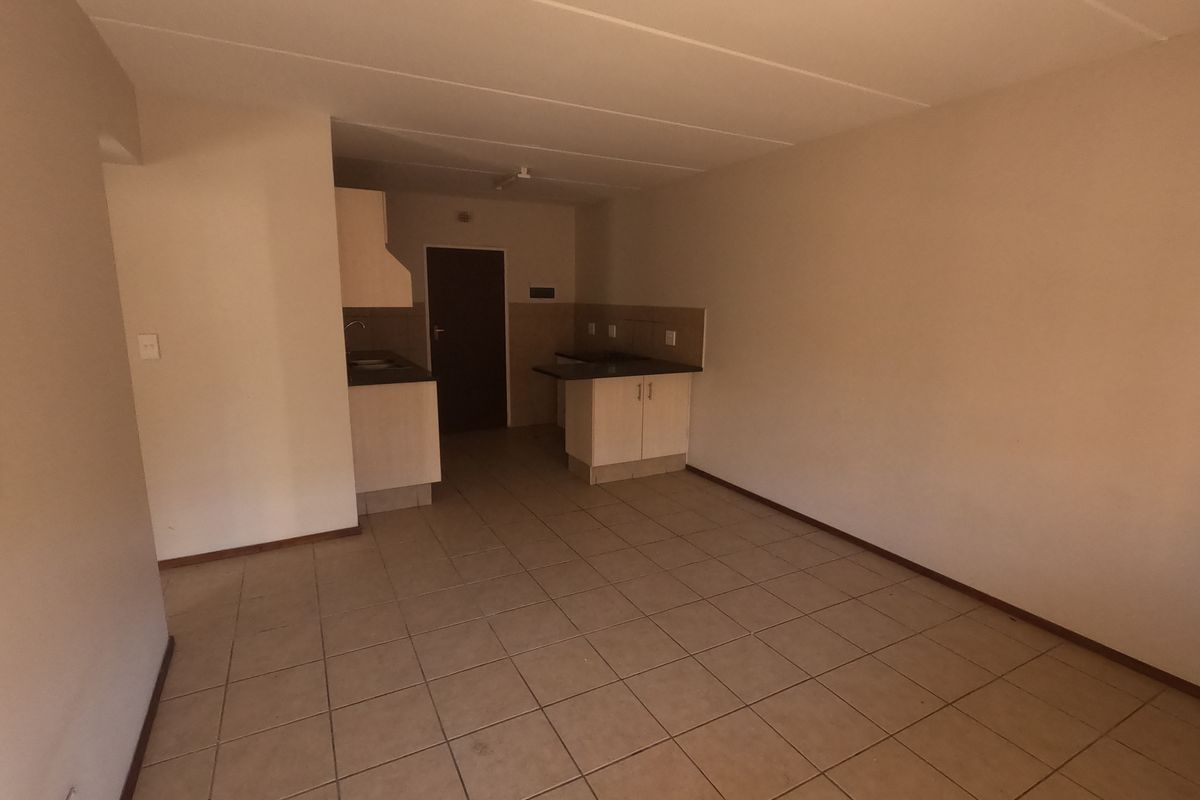 Conveniently Located Apartment with Great Rental Potential - Photo 5
