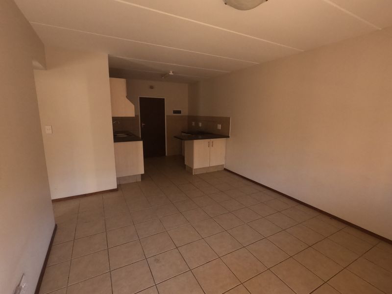 Conveniently Located Apartment with Great Rental Potential - Photo 5