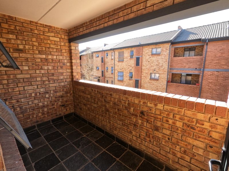 Conveniently Located Apartment with Great Rental Potential - Photo 9