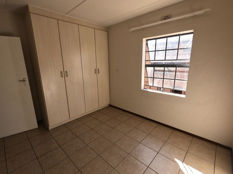 Conveniently Located Apartment with Great Rental Potential - Photo 6