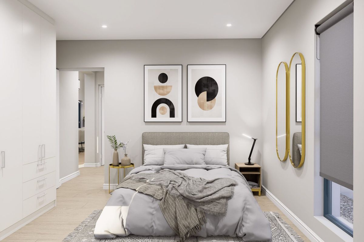 A modern, well-lit bedroom featuring built-in wardrobes, neutral finishes, and a clean, contemporary aesthetic.