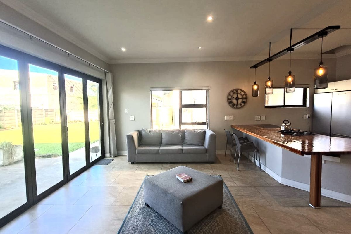 Modern Family Oasis with Luxury Features and Income Potential - Photo 3