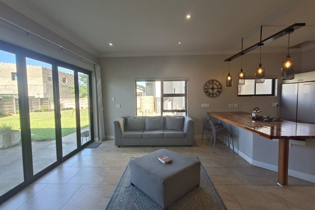 Modern Family Oasis with Luxury Features and Income Potential - Photo 5