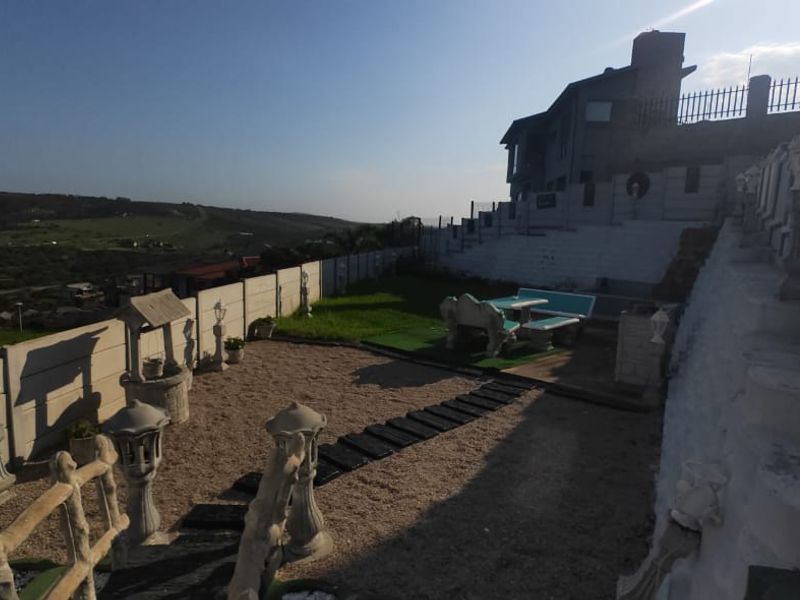 Elevated Coastal Living with Spectacular, Panoramic Ocean Views in Mossel Bay - Photo 9