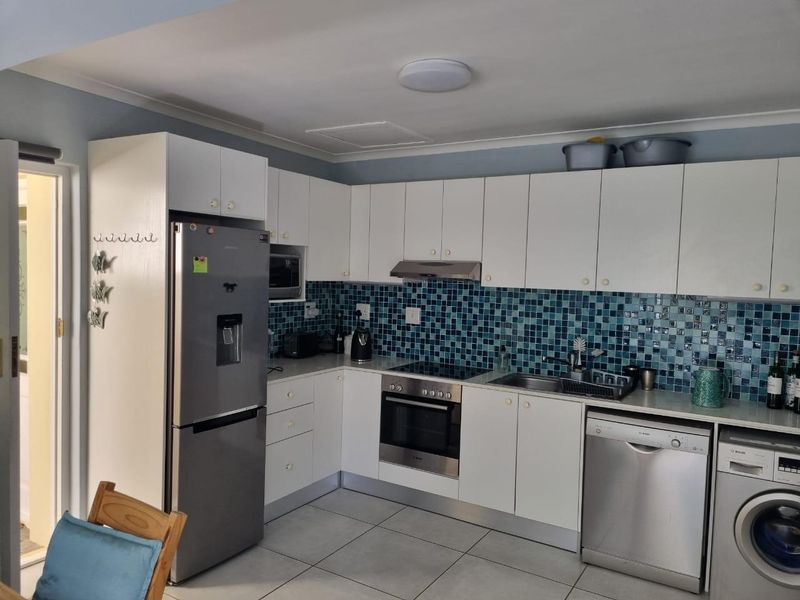 Furnished Garden Cottage - Photo 7