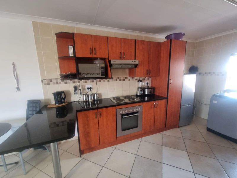 what a lovely spacious flat with a built in braai - Photo 6