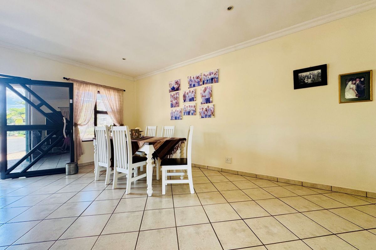 Modern 3-Bedroom Home with Pool For Sale in Rose Acres Estate - Photo 2