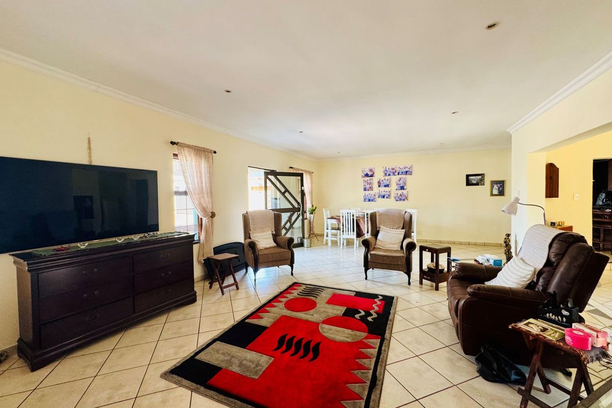 Modern 3-Bedroom Home with Pool For Sale in Rose Acres Estate - Photo 3