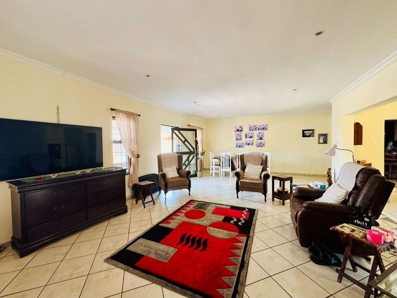 Modern 3-Bedroom Home with Pool For Sale in Rose Acres Estate - Photo 3