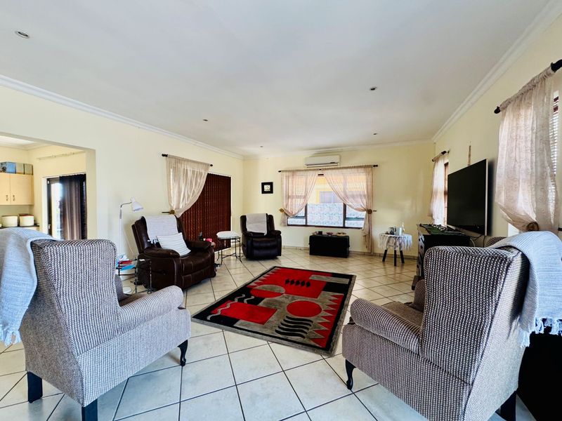 Modern 3-Bedroom Home with Pool For Sale in Rose Acres Estate - Photo 4