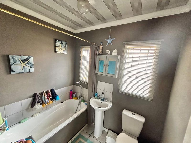 Charming 3-Bedroom Home with Pool & Extra Storage! - Photo 7