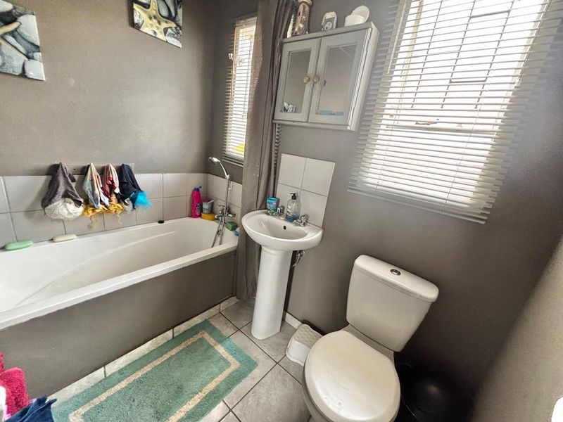 Charming 3-Bedroom Home with Pool & Extra Storage! - Photo 6