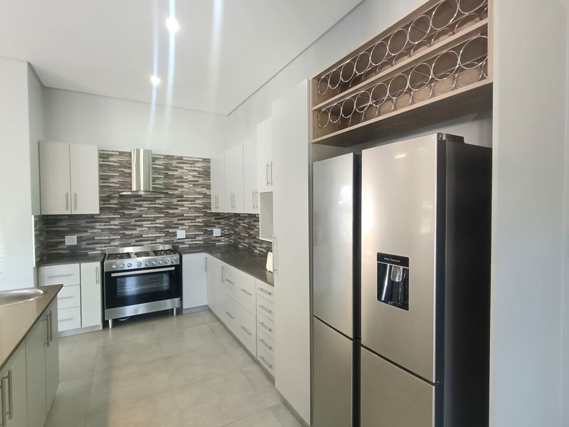 Luxurious Living on the Fairway - Exquisite Five-Bedroom Home in Mzingazi Golf Estate - Photo 7