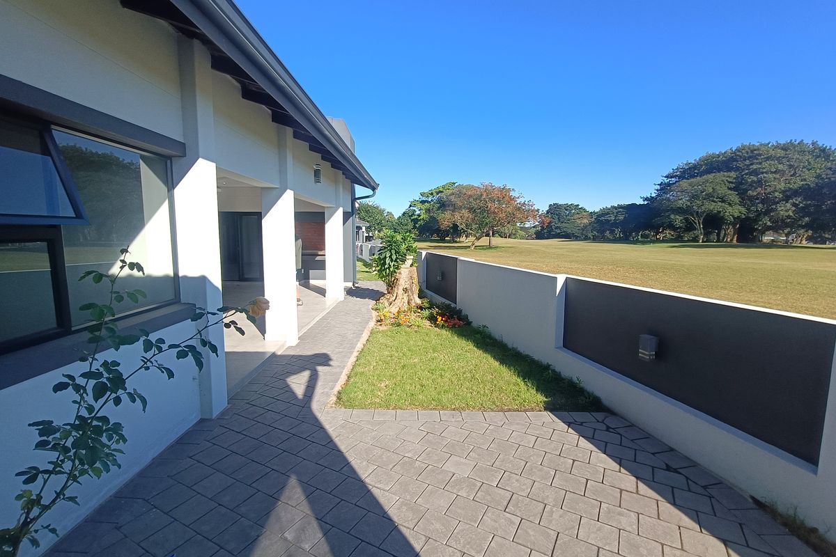 Luxurious Living on the Fairway - Exquisite Five-Bedroom Home in Mzingazi Golf Estate - Photo 4