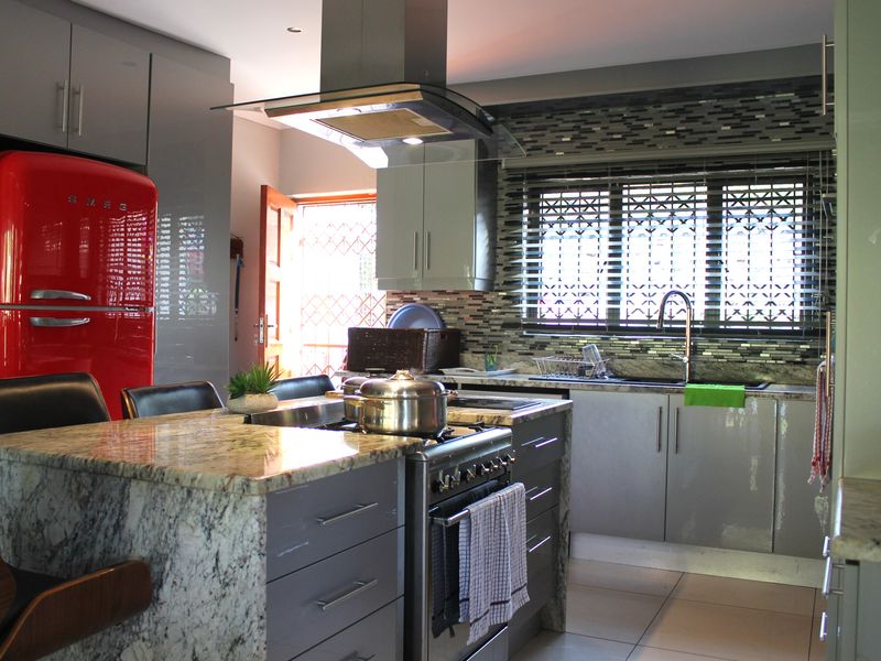 Elegant Investment Oasis with Unmatched Potential - Photo 2