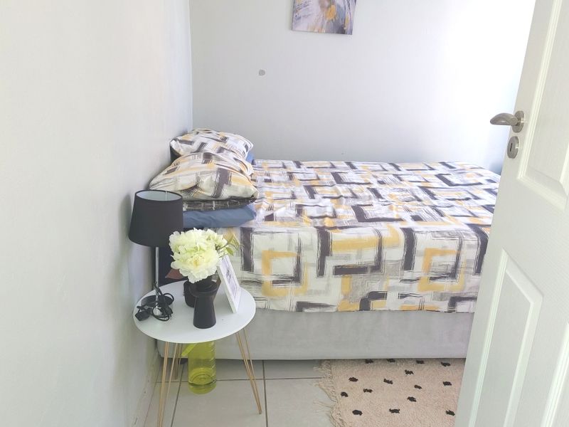 Modern 2-Bedroom Duplex in Secure Gated Estate - Photo 6