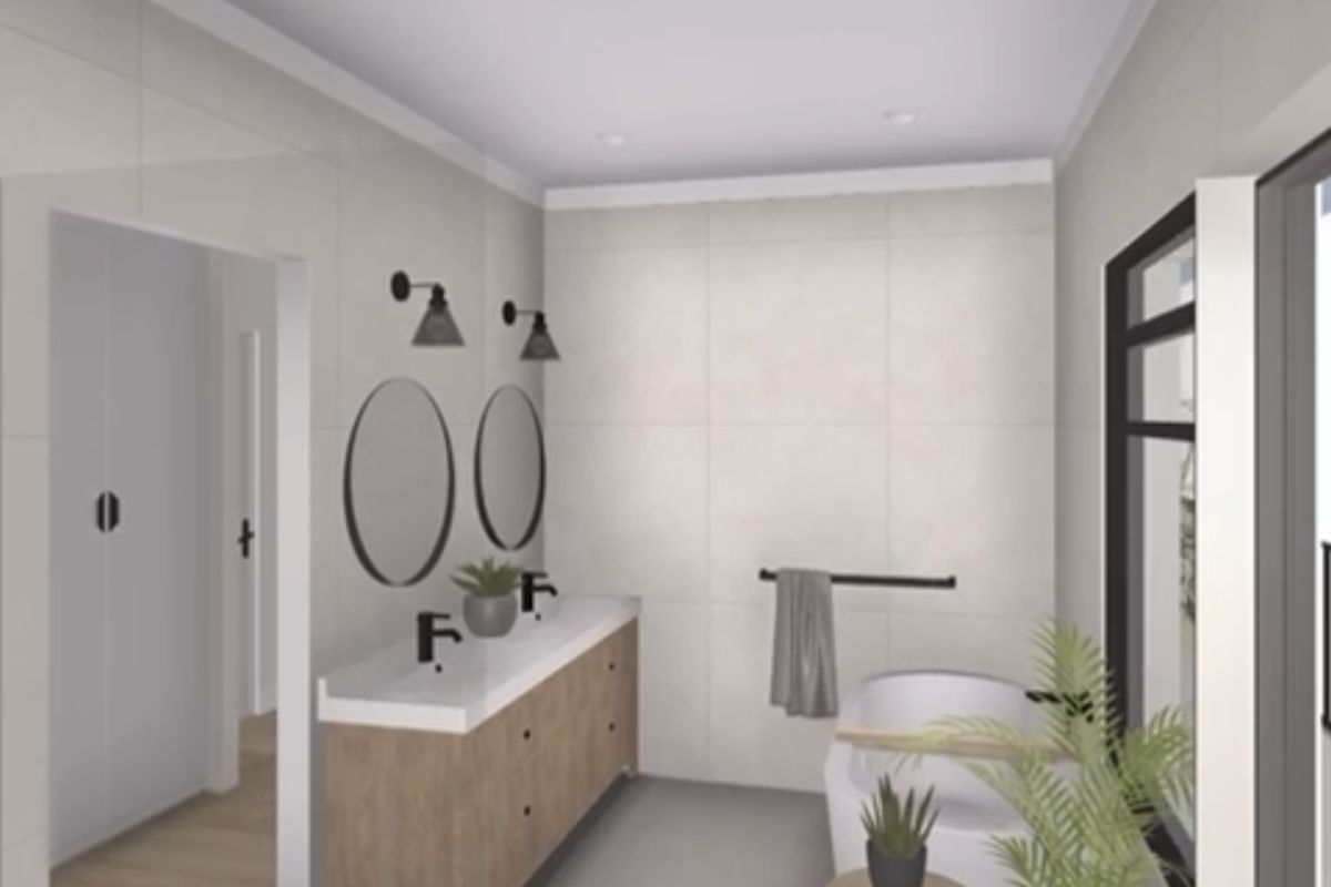Modern bathroom featuring a double vanity, freestanding bathtub, and neutral large-format wall and floor tiles.