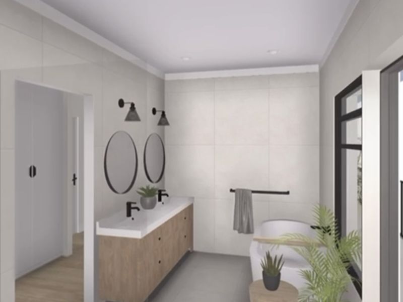 Modern bathroom featuring a double vanity, freestanding bathtub, and neutral large-format wall and floor tiles.