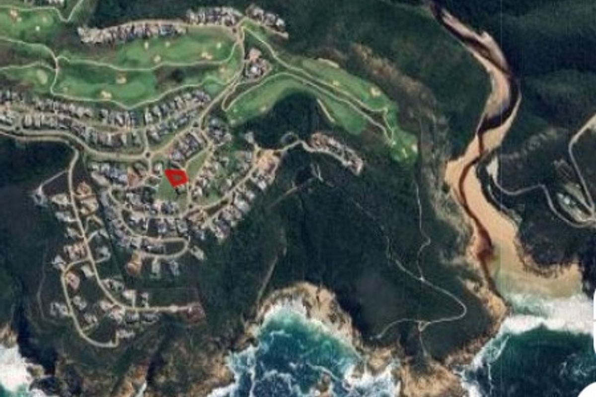 Aerial view of the residential estate showing the location of the vacant land plot highlighted in red.