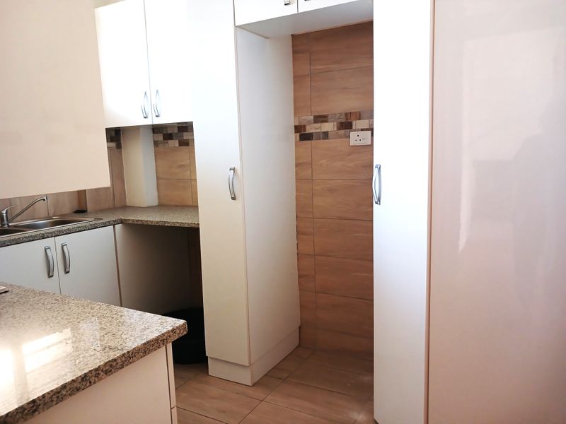 1.5 BEDROOM - 1.5 BATHROOM - 1 LOCK-UP GARAGE - SHAREBLOCK - NORTH BEACH DURBAN - Photo 9