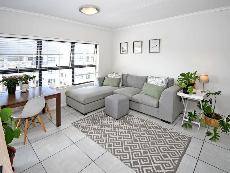 Fall in Love with this Modern 1-Bedroom Apartment in the Luxurious The Whisken Apartment Complex. - Photo 1