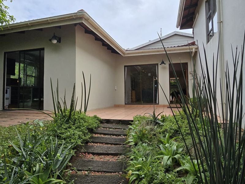 Elegant Double-Storey Residence with Exceptional Features and Coastal Tranquility - Photo 1