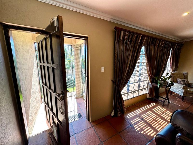 Spacious and private Tuscan style three bedroom home for sale in Secunda - Photo 3