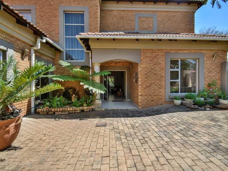 Double-Story Home with Pool in Sought-After Midstream Proper Estate - Photo 5